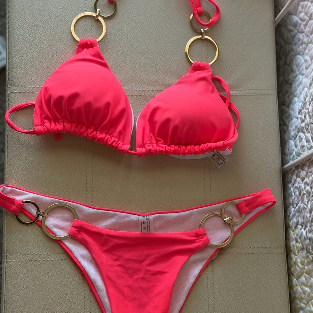 Vibrant Pink Bikini with Gold Ring Accents